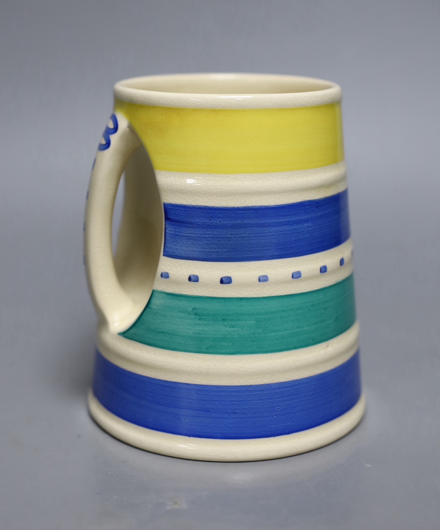 Susie Cooper for Burslem, a banded tankard, 13cm